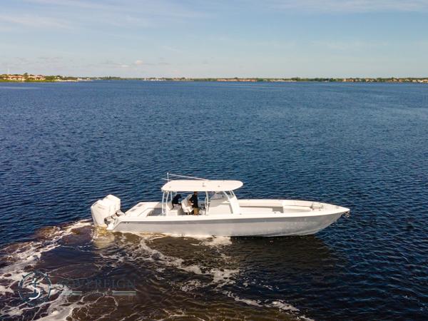 Contender 44 CB 2024 Contender 44 CB boat cruising on open water.