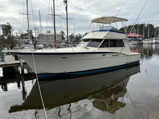 Hatteras 42ft Convertible Sport Fishing 1976 Hatteras 42ft Convertible Sport Fishing boat docked in a marina.