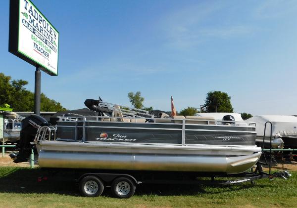 Sun Tracker Fishin' Barge 20 DLX 2024 Sun Tracker Fishin' Barge 20 DLX pontoon boat on a trailer at Tadpole's Marine.