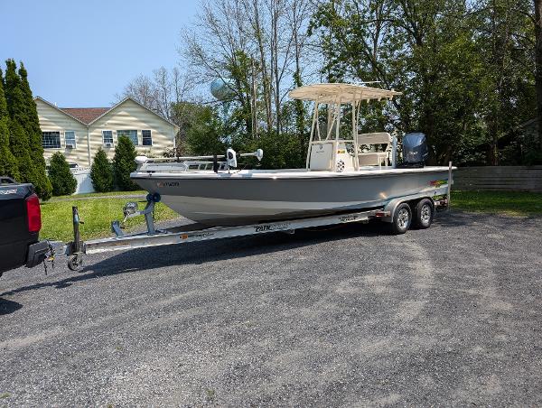 Pathfinder 2400 Pathfinder 2012 Pathfinder 2400 boat on trailer in residential driveway.