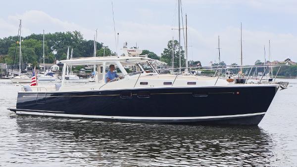 MJM 40z Downeast 2010 MJM 40z Downeast yacht cruising in a marina.