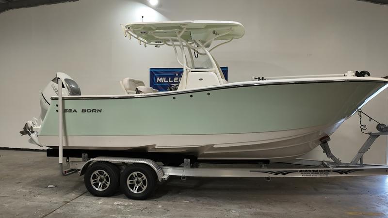 Sea Born SX239 OFFSHORE OPEN LE 2024 Sea Born SX239 Offshore Open LE boat on trailer in showroom.