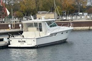 Tiara Yachts 4100 Open 2000 Tiara Yachts 4100 Open docked in a marina, rear view.