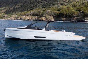 Maxim Yachts 43 comfort Modern Maxim Yachts 43 Comfort, 2026 model, cruising near a scenic coastline.