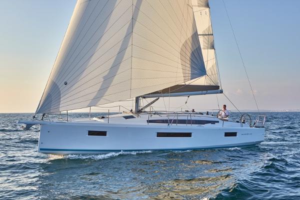 Jeanneau Sun Odyssey 410 2025 Jeanneau Sun Odyssey 410 sailing on open water, showcasing sleek design and performance.