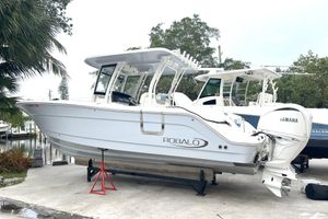 Robalo R302 Center Console 2023 Robalo R302 Center Console boat on display with Yamaha engines.