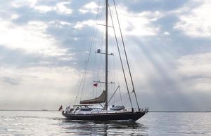 Custom ATM Design Sailing yacht on calm sea under cloudy sky, Custom ATM Design 2006.