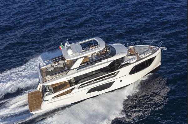 Absolute Navetta 64 2024 Absolute Navetta 64 luxury yacht cruising on open water.