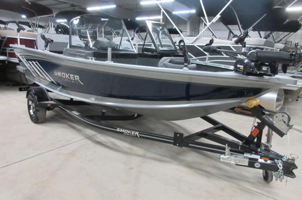 Smoker Craft Pro Angler XL 172 2023 Smoker Craft Pro Angler XL 172 fishing boat on trailer in showroom.