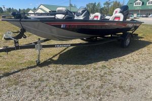 Tracker Pro Team 175 TXW 2017 Tracker Pro Team 175 TXW boat on trailer, parked outdoors.