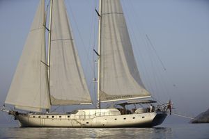 Custom Gulet Motorsailer Custom 2010 Gulet Motorsailer with sails unfurled on calm water.