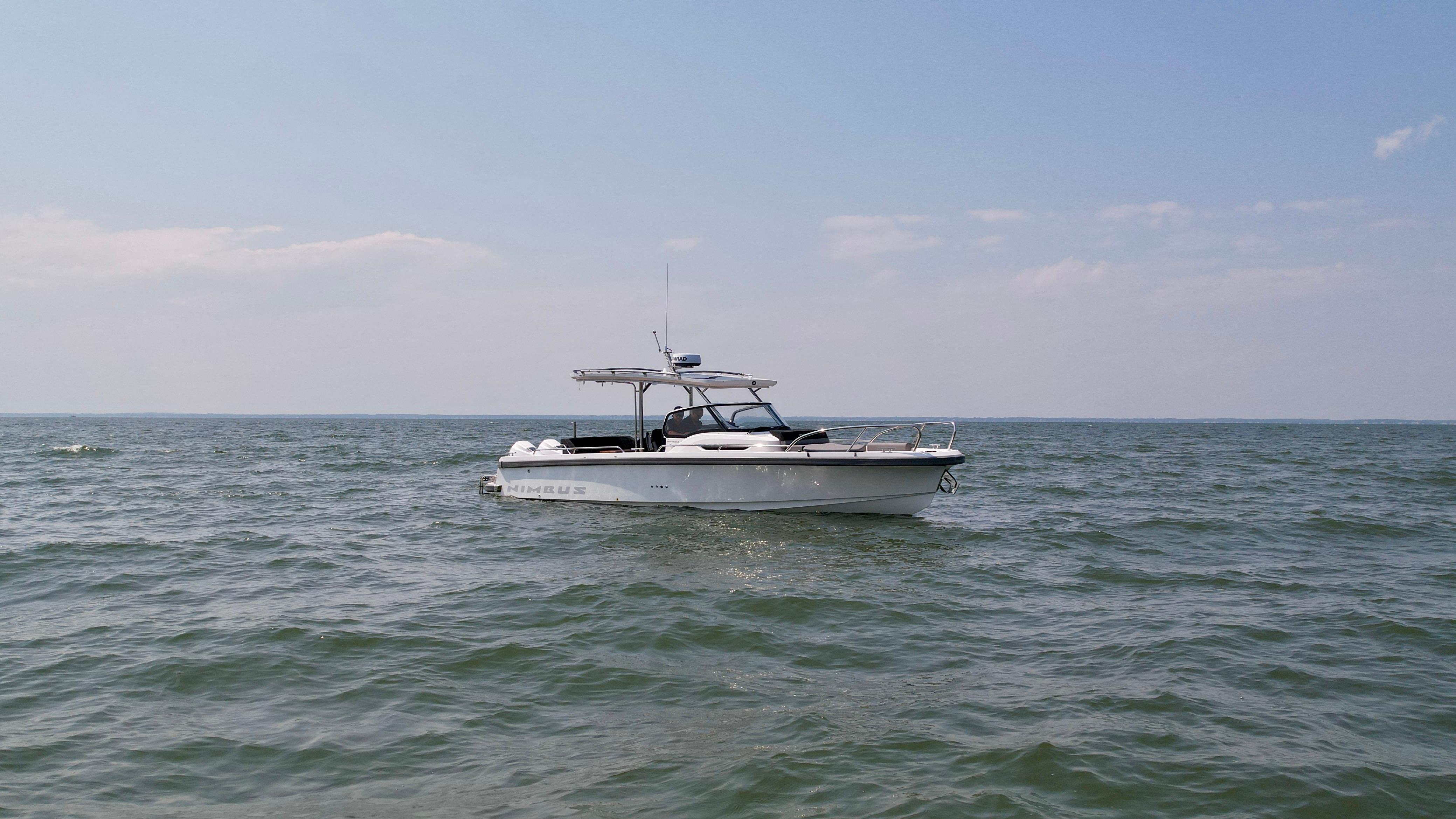Nimbus T9 Nimbus T9 boat on open water under clear sky, 2025 model.