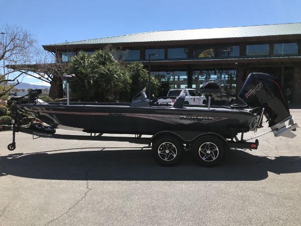Ranger ALPHA 208 2025 Ranger ALPHA 208 boat on trailer, parked outdoors near a building.
