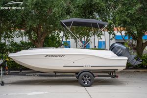 Starcraft SVX 191 OB 2024 Starcraft SVX 191 OB boat on trailer with Yamaha outboard motor, parked outdoors.