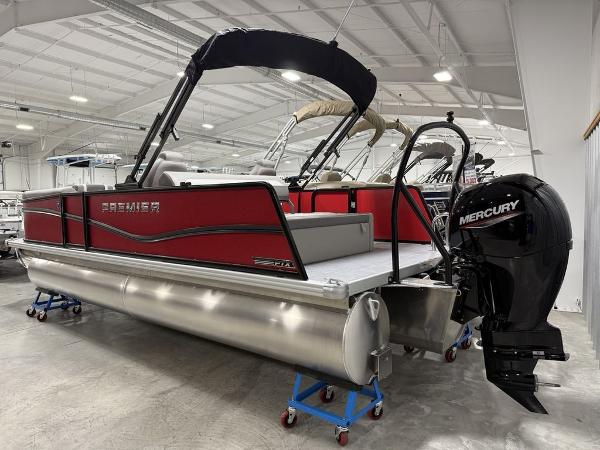 Premier 220 SUNSCAPE RL 2025 Premier 220 SUNSCAPE RL pontoon boat with Mercury engine in showroom.