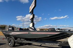 Ranger RT178 2026 Ranger RT178 boat on trailer under clear blue sky.