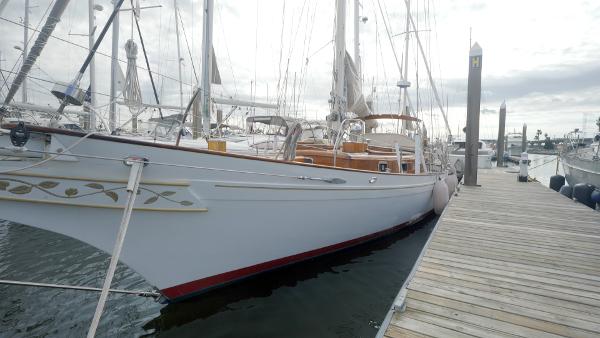 Custom Mashford Bros 1982 Custom Mashford Bros yacht docked at marina, showcasing elegant design and craftsmanship.