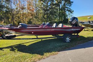 Ranger RT188 2016 Ranger RT188 boat on trailer, parked on grass with trees in background.