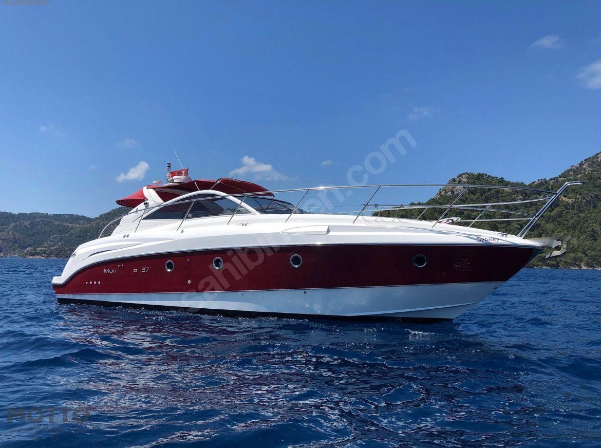 Beneteau Monte Carlo 37 2008 Beneteau Monte Carlo 37 yacht on blue ocean with scenic background.