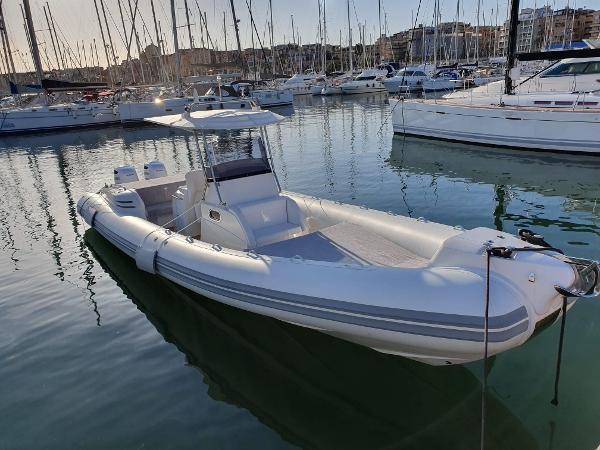 Heaven Heaven 34 White Heaven 34 boat docked in marina, surrounded by sailboats, 2007 model.