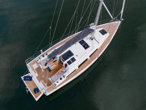 Hanse 348 2025 Hanse 348 sailboat on calm water, aerial view.