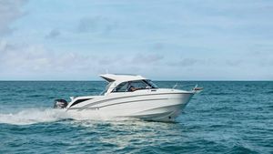 Beneteau Antares 8 V2 OB 2025 Beneteau Antares 8 V2 OB cruising on open sea under clear sky.