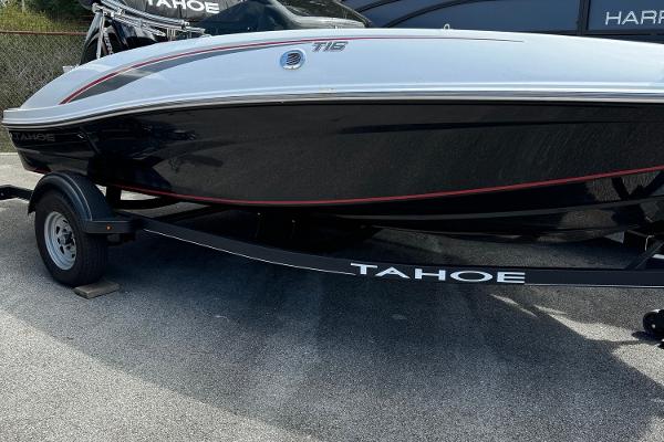 Tahoe T16 2023 Tahoe T16 boat on trailer, black and white design with red accents.