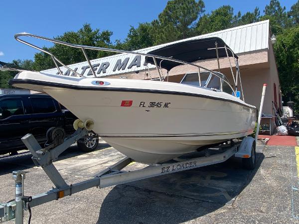 Key West 2020 SE 2005 Key West 2020 SE boat on trailer at marina.
