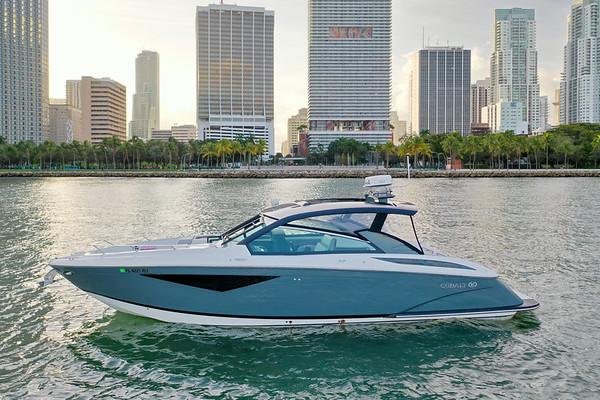 Cobalt A36 2018 Cobalt A36 boat on water with city skyline in background.