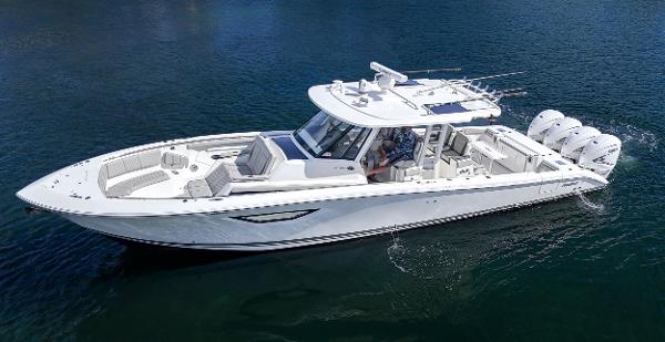 Pursuit S 428 Sport 2022 Pursuit S 428 Sport boat cruising on water, showcasing sleek design and powerful engines.