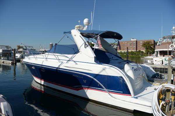 Formula 34 PC 2007 Formula 34 PC yacht docked at marina, featuring sleek blue and white design.