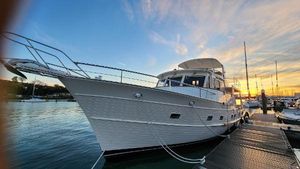 Fleming 58 2024 Fleming 58 yacht docked at sunset, showcasing sleek design and luxury features.