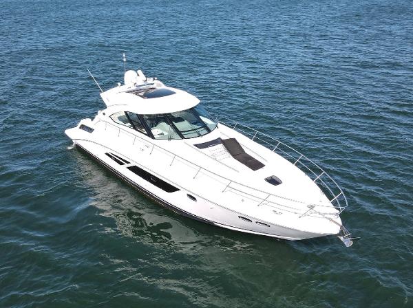 Sea Ray 540 Sundancer 2015 Sea Ray 540 Sundancer yacht cruising on open water.