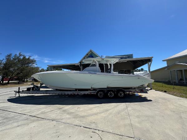 Fountain 39 NX 2019 Fountain 39 NX boat on trailer under clear blue sky.