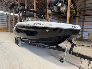 Bayliner DX 2250 2021 Bayliner DX 2250 boat on trailer in storage facility.