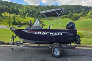 Tracker Pro Guide V-175 Combo 2026 Tracker Pro Guide V-175 Combo boat on trailer, scenic background.