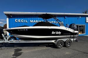 Chaparral 21 SSi OB 2024 Chaparral 21 SSi OB boat on trailer outside Cecil Marine Supply.