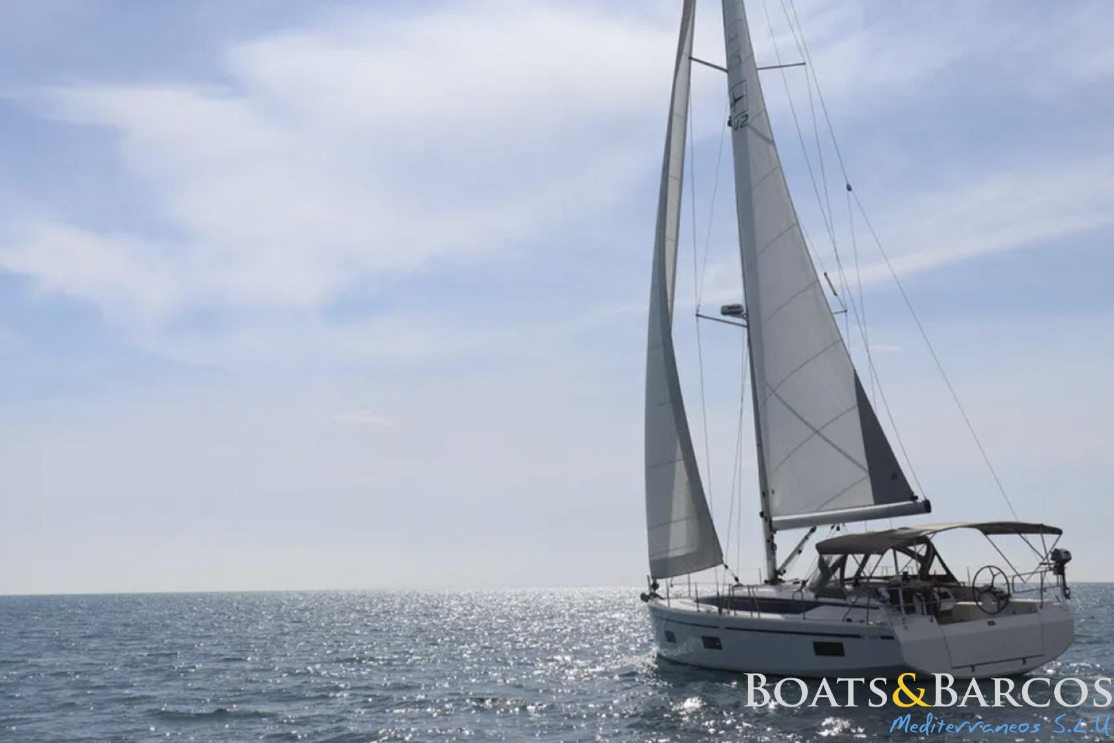 Bavaria C42 Sailing yacht Bavaria C42 2022 on open sea under clear sky.