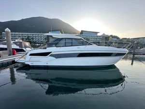 Bavaria 40 Bavaria 40 yacht, 2017 model, docked at marina with scenic mountain backdrop.