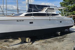 Gemini Legacy 35 2014 Gemini Legacy 35 catamaran on dry dock, white hull, clear sky background.