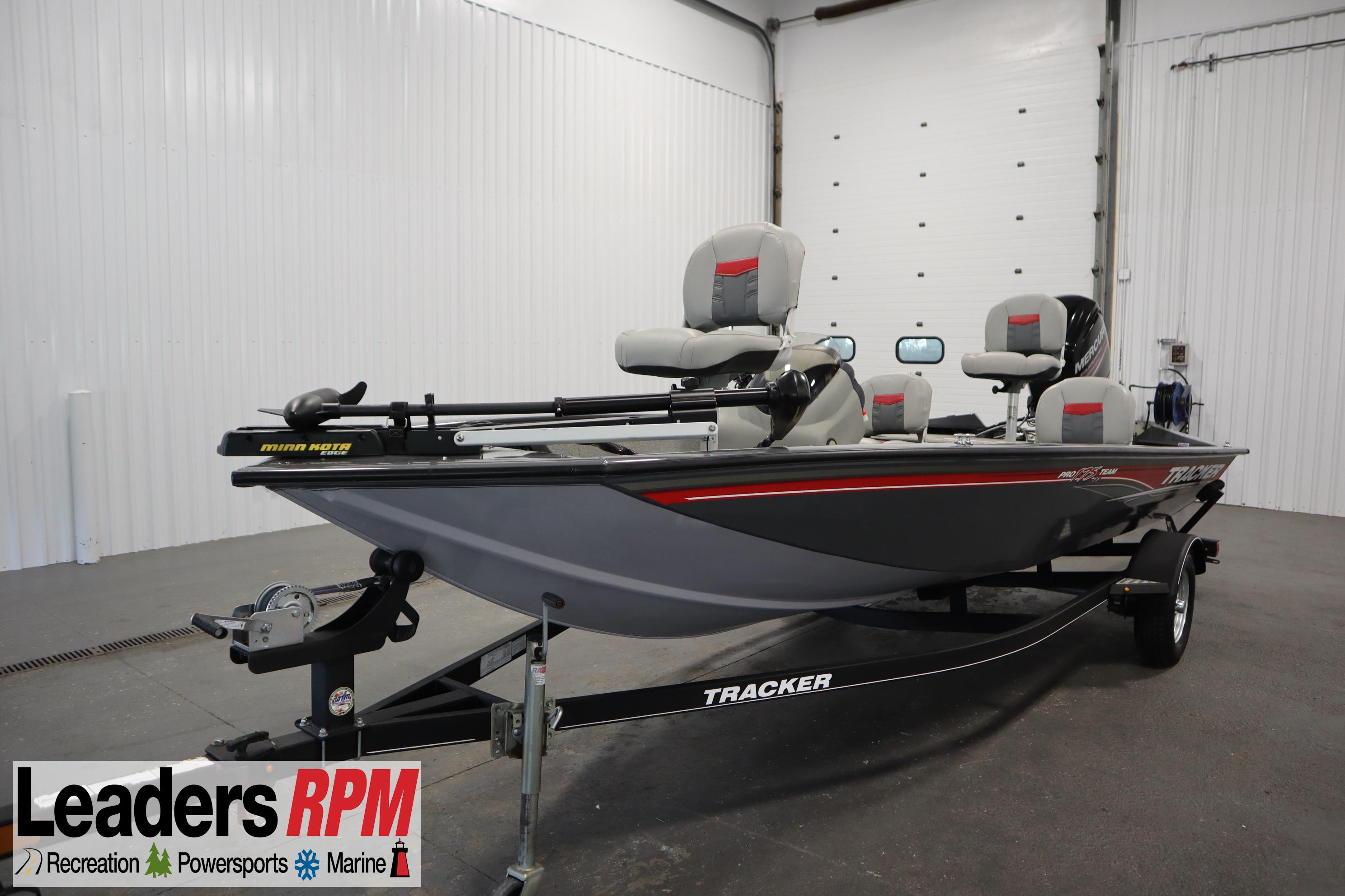 Tracker 20 CW PONTOON 2017 Tracker 20 CW Pontoon boat in showroom, featuring gray and red design.