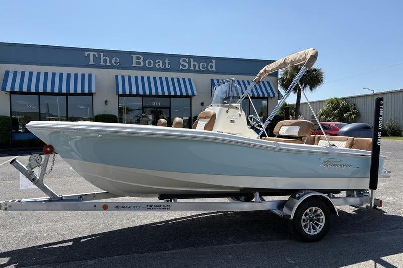 Pioneer Islander 180 2026 Pioneer Islander 180 boat on trailer outside The Boat Shed dealership.
