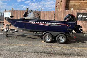 Tracker Pro Guide V-175 WT 2024 Tracker Pro Guide V-175 WT boat on trailer, parked outdoors.