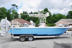 Tidewater 2700 Carolina Bay 2019 Tidewater 2700 Carolina Bay boat on trailer, parked in residential area.