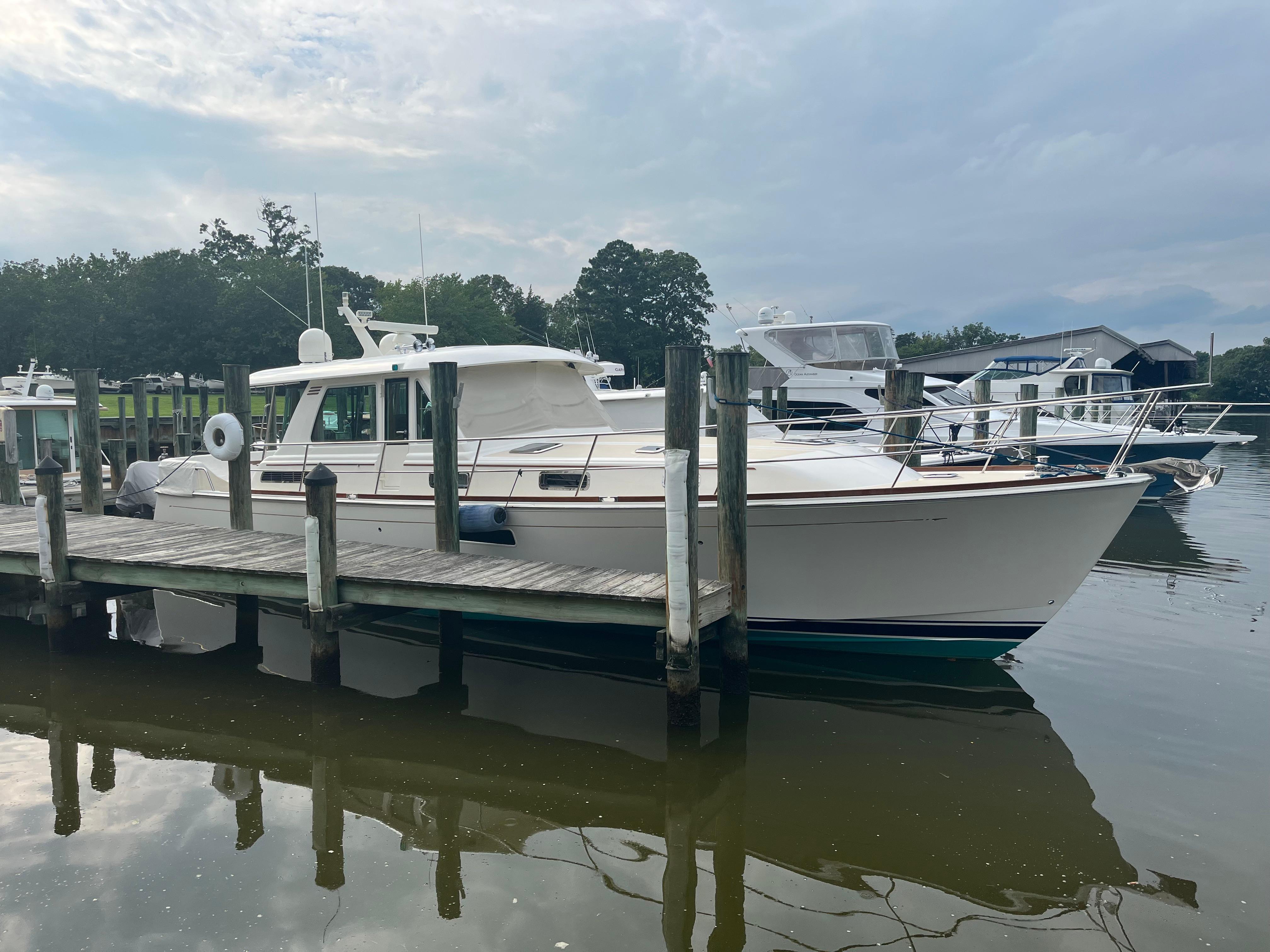 Sabre 48 Salon Express 2021 Sabre 48 Salon Express yacht docked at a marina.