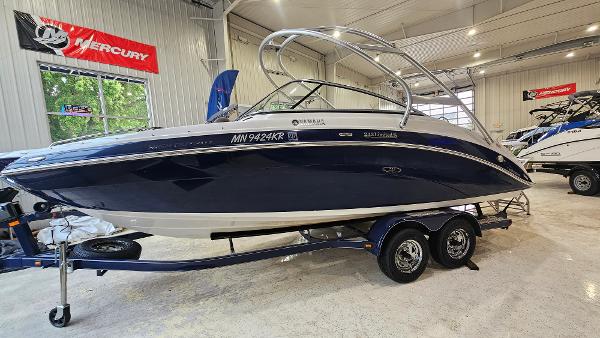 Yamaha Boats 242 Limited S 2011 Yamaha Boats 242 Limited S on trailer in showroom, side view.