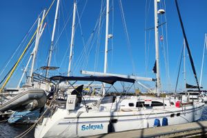 Catalina 387 Sailboat Catalina 387, 2007 model, docked at marina under clear blue sky.