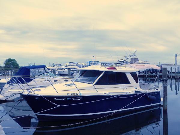 Cutwater C 26 2014 Cutwater C 26 boat docked at a marina.