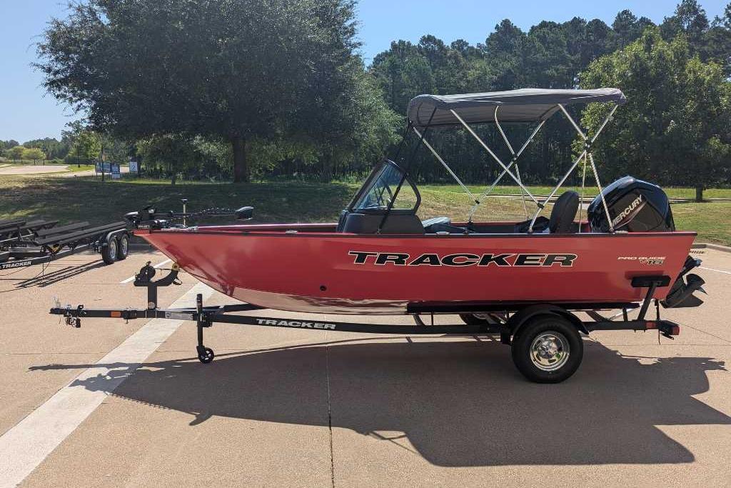 Tracker Pro Guide V-16 WT 2026 Tracker Pro Guide V-16 WT boat on trailer, parked outdoors.