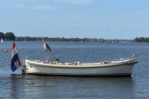 Jan Van Gent 8.20 Open Jan Van Gent 8.20 Open boat, 2005 model, on calm water with Dutch flag.